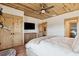 Bedroom with wood ceiling, built-in closet and TV at 6500 Parkers Ferry Rd, Adams Run, SC 29426