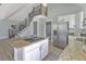 White kitchen with stainless steel appliances and granite countertops at 2317 Sunfish Cir, Charleston, SC 29412
