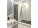 Modern bathroom with a walk-in shower and marble tile at 2317 Sunfish Cir, Charleston, SC 29412