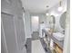 Elegant bathroom with double vanity, tiled floors, and a modern aesthetic at 2317 Sunfish Cir, Charleston, SC 29412