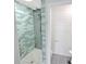 Spa-like shower with pebble floor and updated fixtures at 2317 Sunfish Cir, Charleston, SC 29412