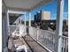 Spacious balcony overlooking the ocean and cityscape at 106 W Arctic Ave # 1D, Folly Beach, SC 29439