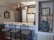 Kitchen with breakfast bar and white cabinets at 106 W Arctic Ave # 1D, Folly Beach, SC 29439
