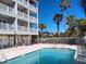 Relaxing community pool area with ample deck space at 106 W Arctic Ave # 1D, Folly Beach, SC 29439
