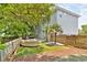 Backyard with pool, seating, and lush landscaping at 7 33Rd Ave, Isle of Palms, SC 29451