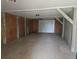 Empty garage with concrete floor and overhead door at 757 Backfield Rd, Walterboro, SC 29488