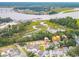 Aerial view of houses near the water with new construction at 1157 Oak Bluff Ave, Charleston, SC 29492