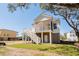 Back exterior view of two-story house with deck and stairs at 1157 Oak Bluff Ave, Charleston, SC 29492