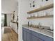 Kitchen pantry with open shelving and blue cabinets at 374 Wappoo Trace Ln, Summerville, SC 29486