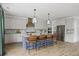 Modern kitchen with blue island, stainless steel appliances, and ample counter space at 374 Wappoo Trace Ln, Summerville, SC 29486