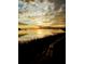 Scenic sunset over calm water at 82 Mariners Cay Dr, Folly Beach, SC 29439