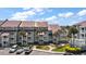 Attractive three-story building with ample parking at 82 Mariners Cay Dr, Folly Beach, SC 29439