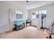 Empty bedroom with hardwood floors and two windows needing renovation at 1157 Symmes Dr, Charleston, SC 29407