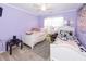 Charming bedroom with two twin beds, and a playful atmosphere at 8217 Little Sydneys Way, North Charleston, SC 29406