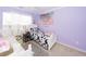 Bedroom with two twin beds and large window with natural light at 8217 Little Sydneys Way, North Charleston, SC 29406