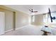 Bright bedroom featuring carpet, large windows and ceiling fan at 14 Lockwood Dr # 10C, Charleston, SC 29401