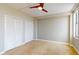 Spacious bedroom with double closets and ceiling fan at 14 Lockwood Dr # 10C, Charleston, SC 29401