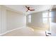 Bright bedroom with neutral walls and ceiling fan at 14 Lockwood Dr # 10C, Charleston, SC 29401