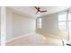 Bright bedroom with neutral walls and ceiling fan at 14 Lockwood Dr # 10C, Charleston, SC 29401