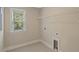Laundry room with window, shelving and built in cabinets at 1161 Oak Bluff Ave, Charleston, SC 29492