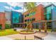Modern school building with a courtyard and benches at 3834 Delinger Dr, Mount Pleasant, SC 29466