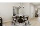 Bright dining room featuring a round table and four chairs at 214 Greenling St, Goose Creek, SC 29445