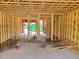 Unfinished room with exposed framing and concrete floor at 212 Greenling St, Goose Creek, SC 29445