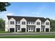 Exterior view of charming new townhomes with black accents at 212 Greenling St, Goose Creek, SC 29445