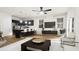 Open living room and kitchen with island and stainless steel appliances at 212 Greenling St, Goose Creek, SC 29445