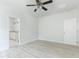 Spacious bedroom with ceiling fan and access to bathroom at 105 Equestrian Ct, Summerville, SC 29486