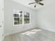 Bright bedroom with ceiling fan and large window at 105 Equestrian Ct, Summerville, SC 29486