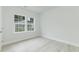 Simple bedroom with large window and wood flooring at 105 Equestrian Ct, Summerville, SC 29486