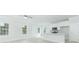 Modern kitchen with white cabinets, island, and stainless steel appliances at 105 Equestrian Ct, Summerville, SC 29486