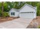 New construction home with white siding and a two-car garage at 105 Equestrian Ct, Summerville, SC 29486