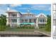 Stunning two-story home with pool, expansive porch, and detached garage at 34 Waterway Island Dr, Isle of Palms, SC 29451