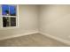 Empty bedroom featuring neutral walls and carpet at 208 Greenling St, Goose Creek, SC 29445