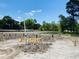 New home construction: poured foundation with plumbing rough-in at 208 Greenling St, Goose Creek, SC 29445