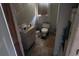 Small bathroom needing renovation, with worn fixtures at 189 Joe Felder Rd, Ridgeville, SC 29472