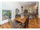 Charming dining room with hardwood floors and a rustic wooden table at 2128 Rookery Ln, Charleston, SC 29414