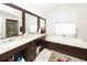 Elegant bathroom with double sinks, a large soaking tub, and a walk-in shower at 2128 Rookery Ln, Charleston, SC 29414