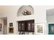 Built-in wet bar with glass-front cabinetry and wine storage at 2128 Rookery Ln, Charleston, SC 29414