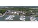 Aerial view of waterfront homes and marina at 1955 Marsh Oak Ln, Johns Island, SC 29455
