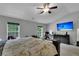Spacious main bedroom with a large TV and work area at 215 Breckingridge Dr, Ladson, SC 29456