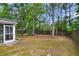 Backyard with a screened porch and wooden fence at 215 Breckingridge Dr, Ladson, SC 29456