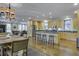 Spacious kitchen with hardwood floors and an island at 614 E Cooper Ave, Folly Beach, SC 29439