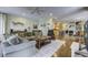 Relaxing living room with hardwood floors and sectional sofa at 614 E Cooper Ave, Folly Beach, SC 29439