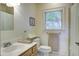 Clean bathroom with shower/tub combo, and updated fixtures at 614 E Cooper Ave, Folly Beach, SC 29439