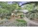 Charming guest house nestled in a lush garden setting at 614 E Cooper Ave, Folly Beach, SC 29439