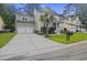 Two-story house with a two-car garage and a large front yard at 3336 Toomer Kiln Cir, Mount Pleasant, SC 29466