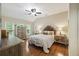 Spacious bedroom with hardwood floors, large bed, and plenty of natural light at 3336 Toomer Kiln Cir, Mount Pleasant, SC 29466